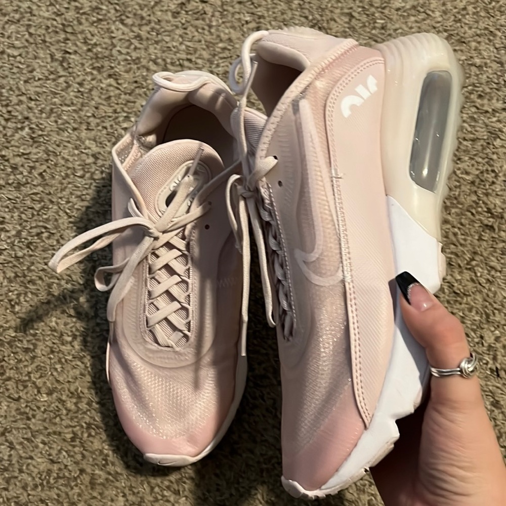 Selling baby pink Nikes, size 9.5. They are super comfy just a little too small